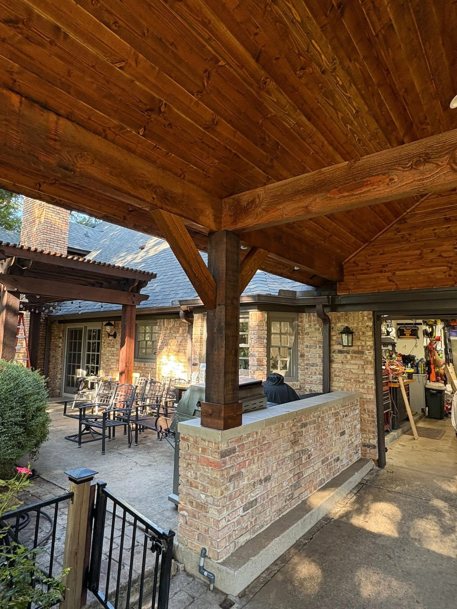 Connected patio area with brick walls
