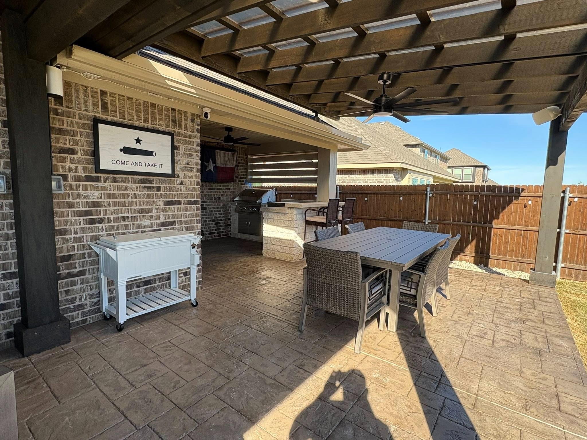Pergola and dining area daytime view