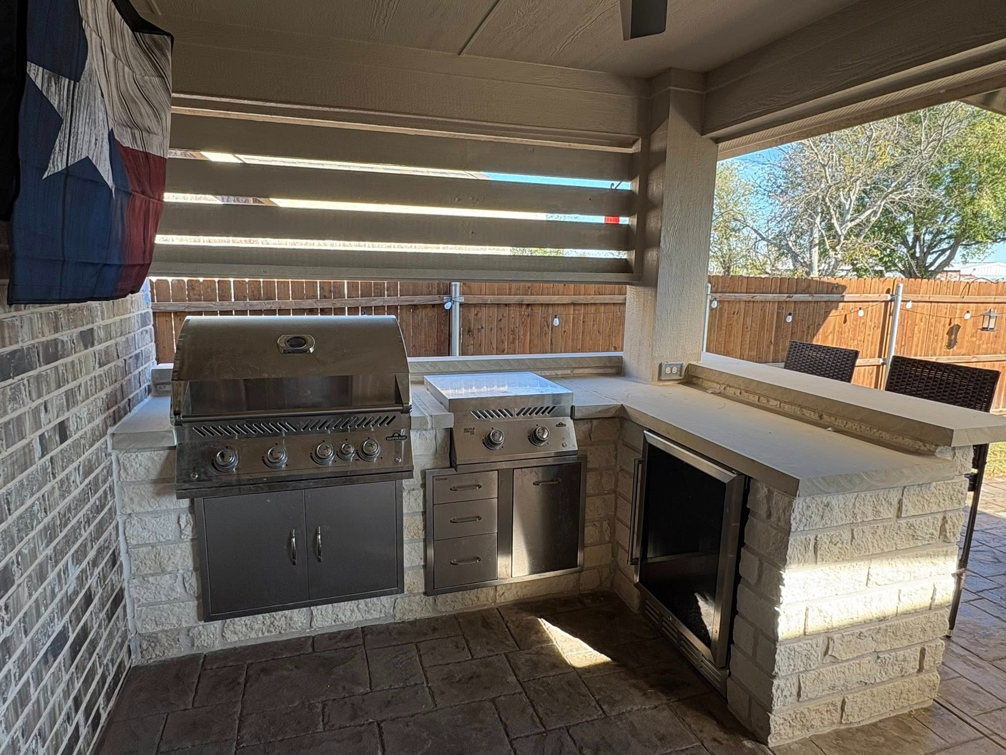 Built-in grill and beverage fridge detail