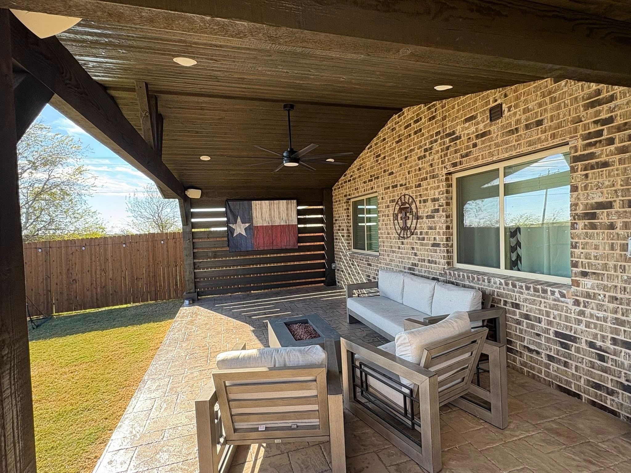 Lounge seating with Texas flag daytime