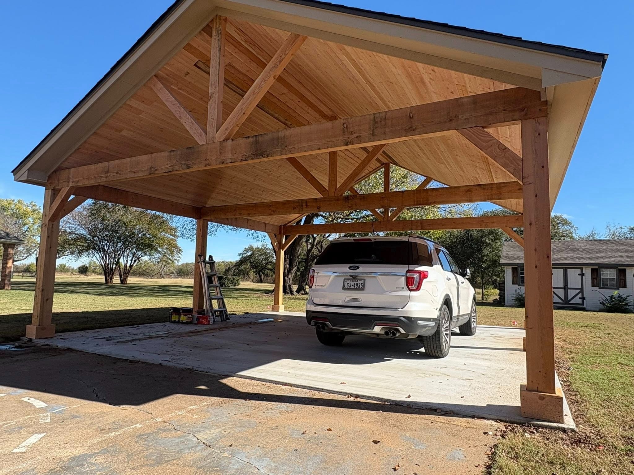 Framing progress — rafters and trusses going up