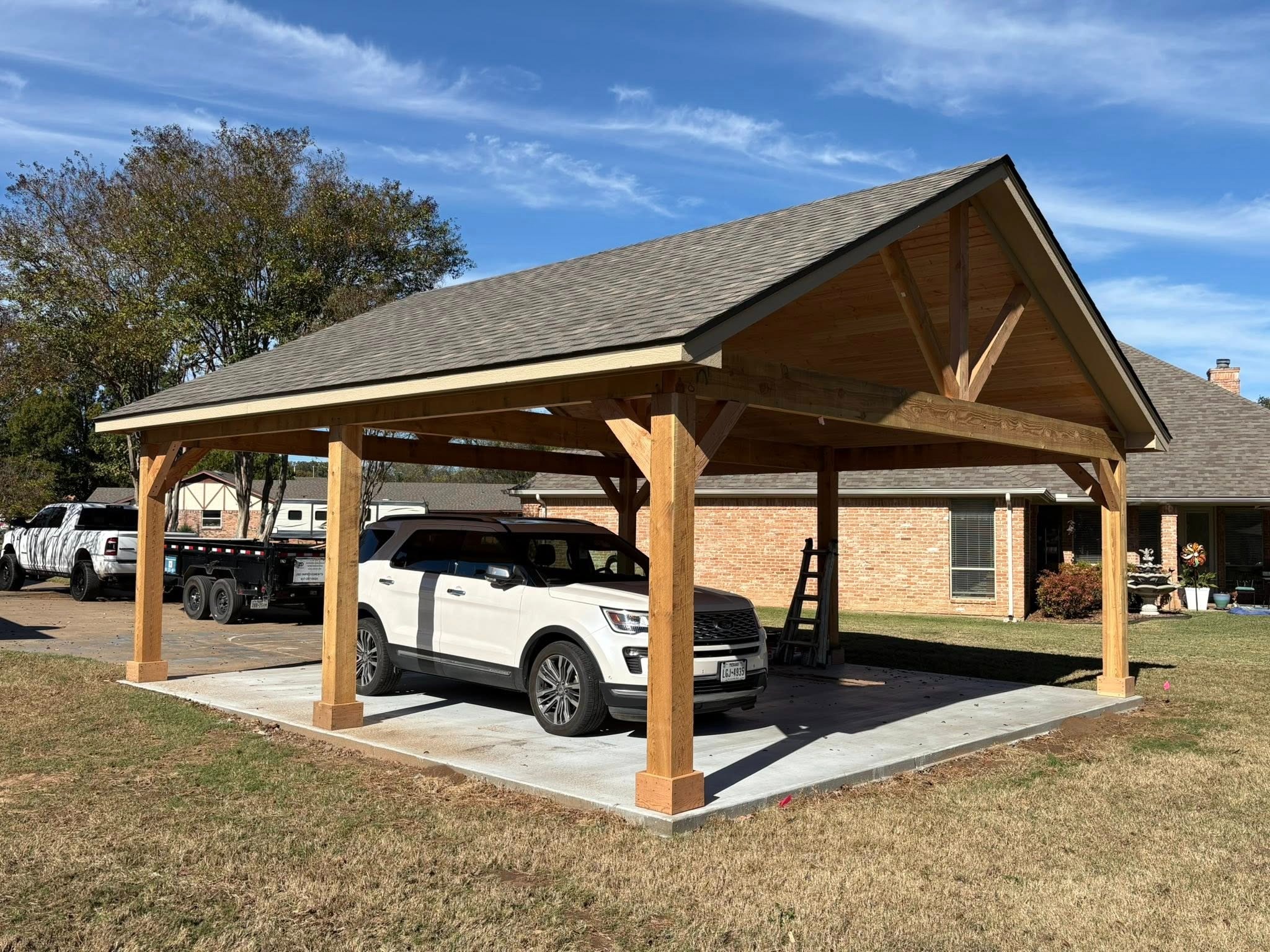 Completed rural timber-frame carport