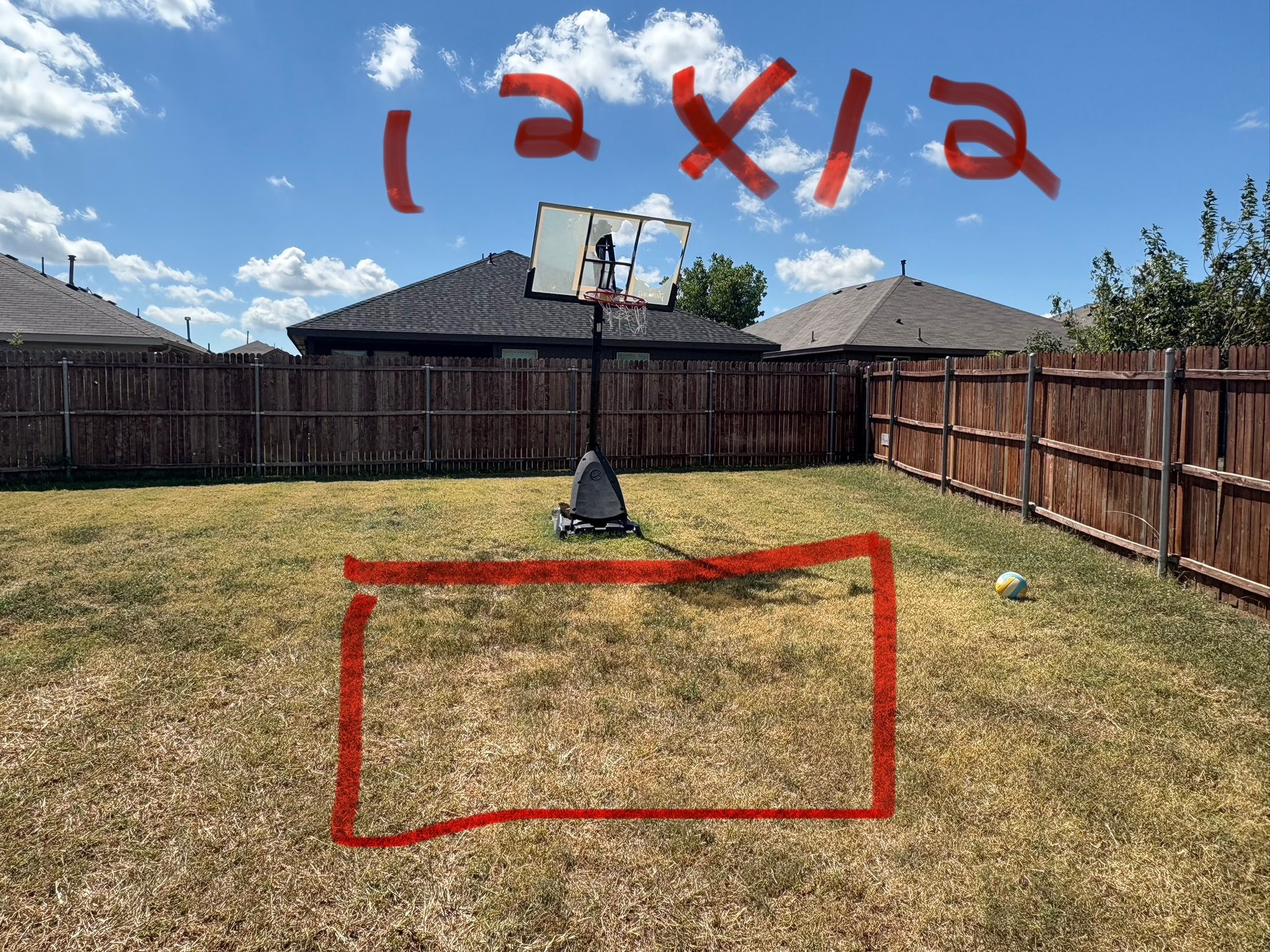 Before — backyard marked for concrete