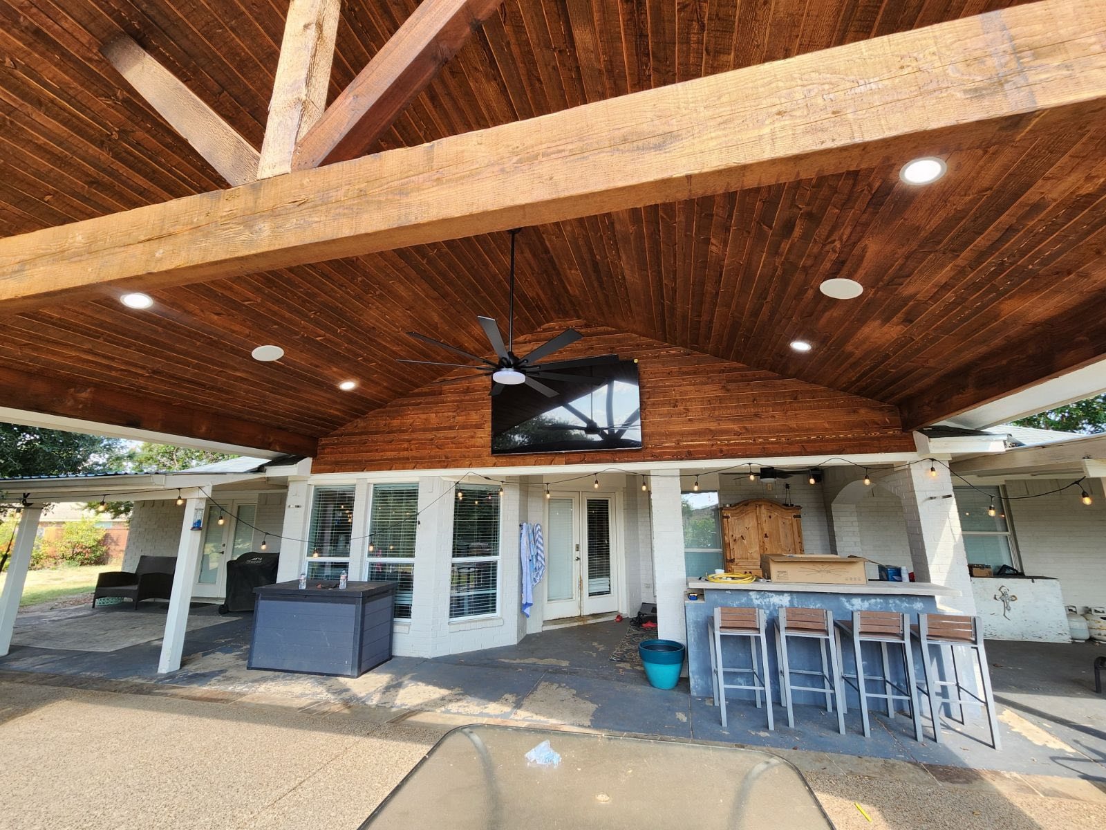 Interior ceiling detail with TV mount — stained