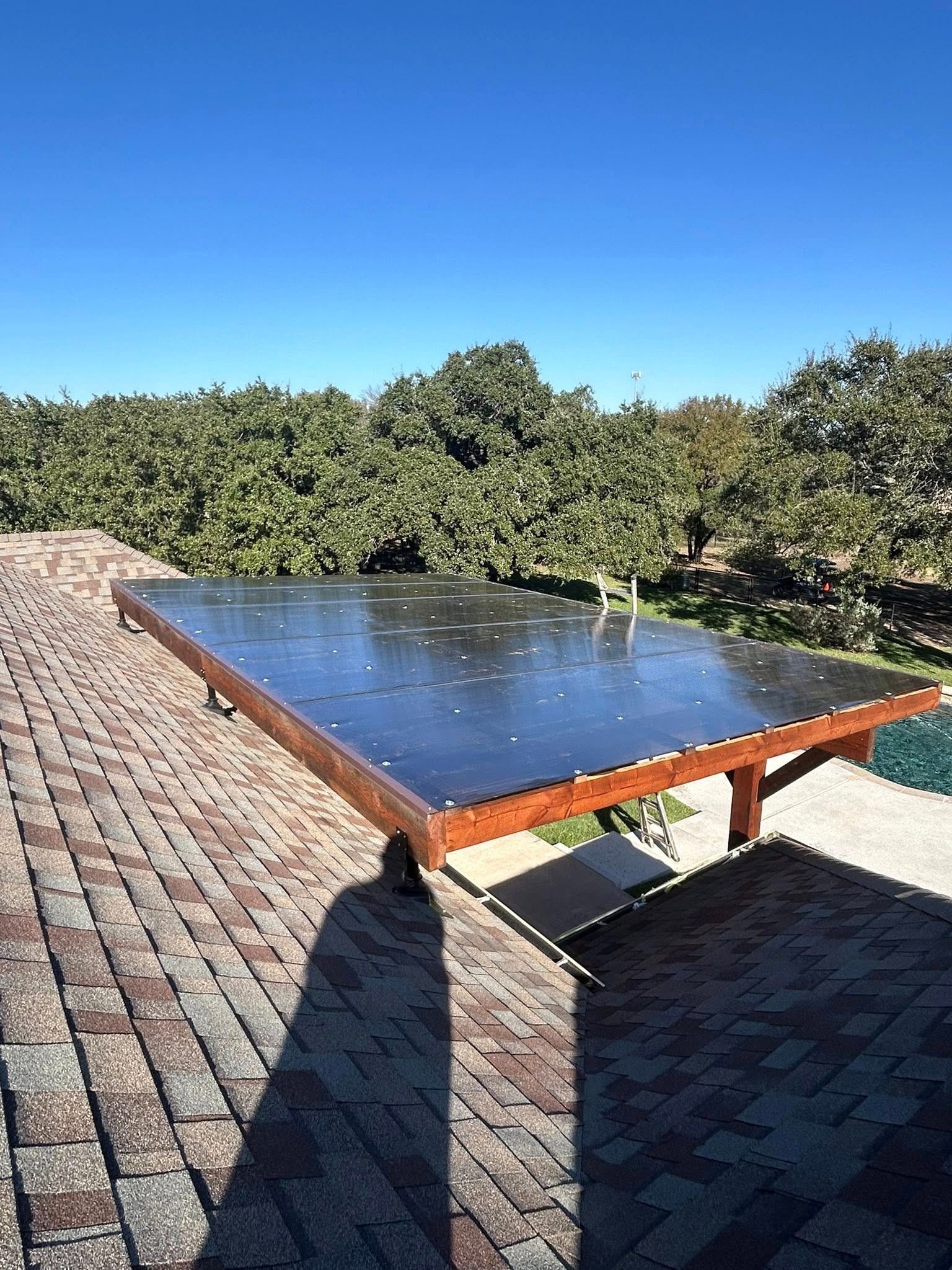 Rooftop solar panels integrated with pergola