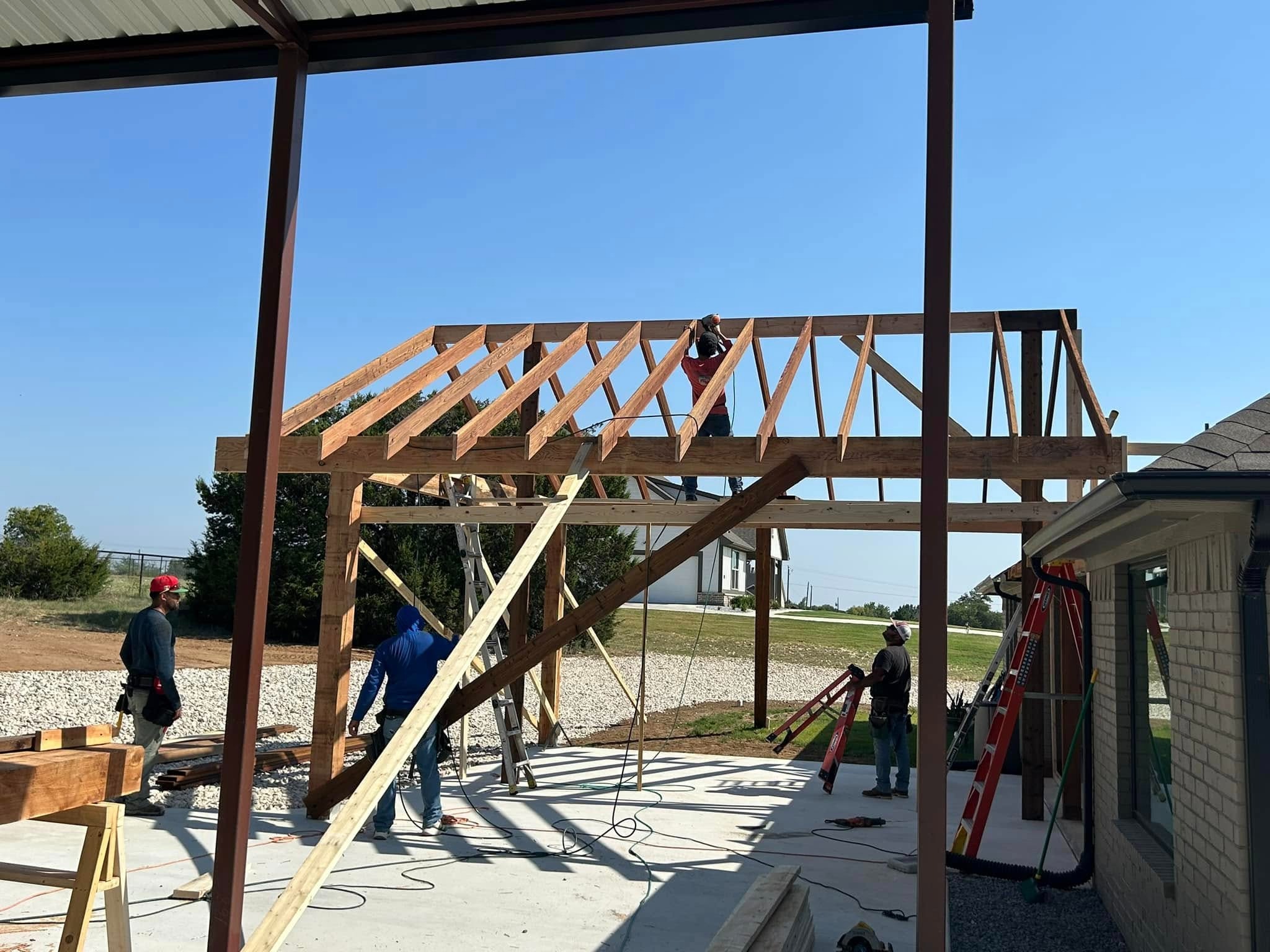 Framing — trusses and rafters going up
