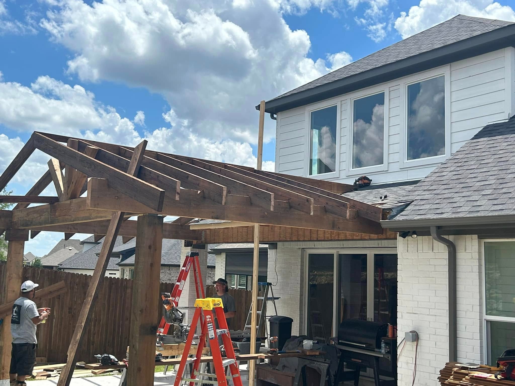 Pergola framing close-up with crew